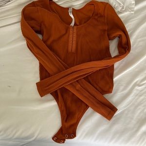 Cute brown thong body suit